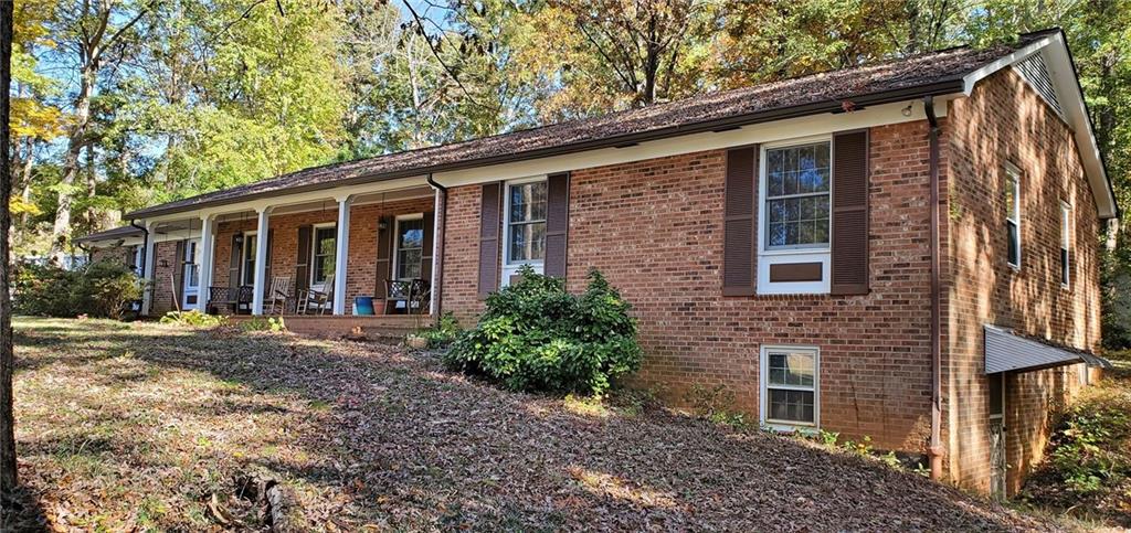 1709 Bethel Road Morganton, NC 28655 - Photo 3 of 21 a front view of a house with garden