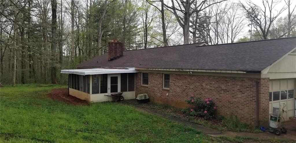 1709 Bethel Road Morganton, NC 28655 - Photo 4 of 21 a view of a house with backyard and garden