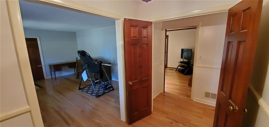 1709 Bethel Road Morganton, NC 28655 - Photo 6 of 21 a view of a hallway with closet and a living room