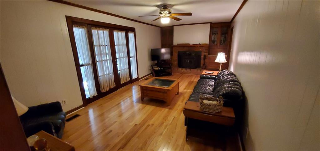 1709 Bethel Road Morganton, NC 28655 - Photo 9 of 21 a room with furniture and wooden floor