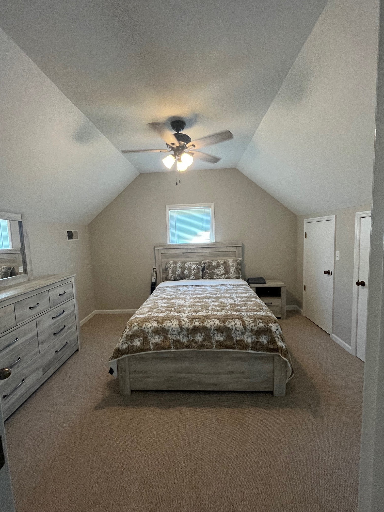 1450 Donna Road Lewisburg, TN 37091 - Photo 17 of 33 a bedroom with a bed and a chandelier
