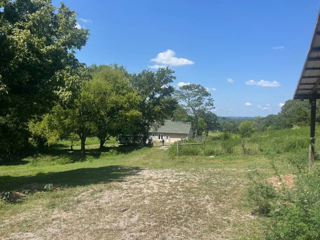 a view of a car in front of house