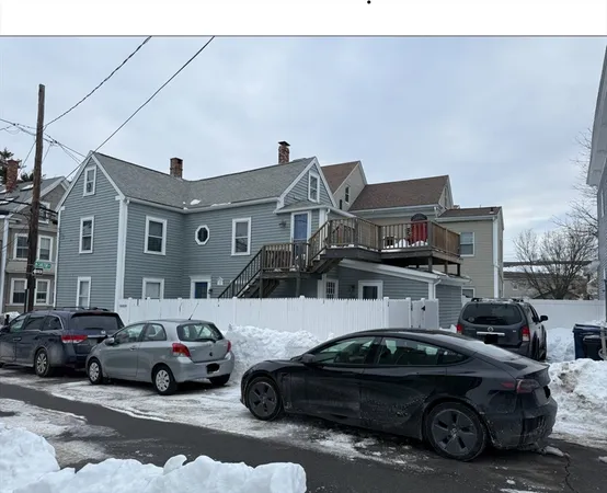 a car parked in front of a house