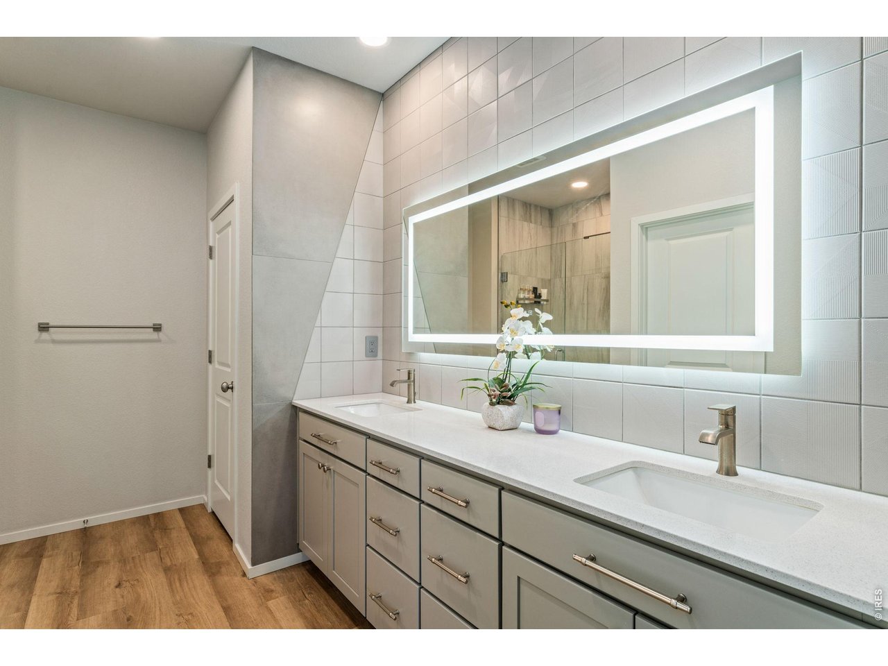 5018 Leopold Loop Timnath, CO 80547 - Photo 28 of 50 a bathroom with a sink and a mirror