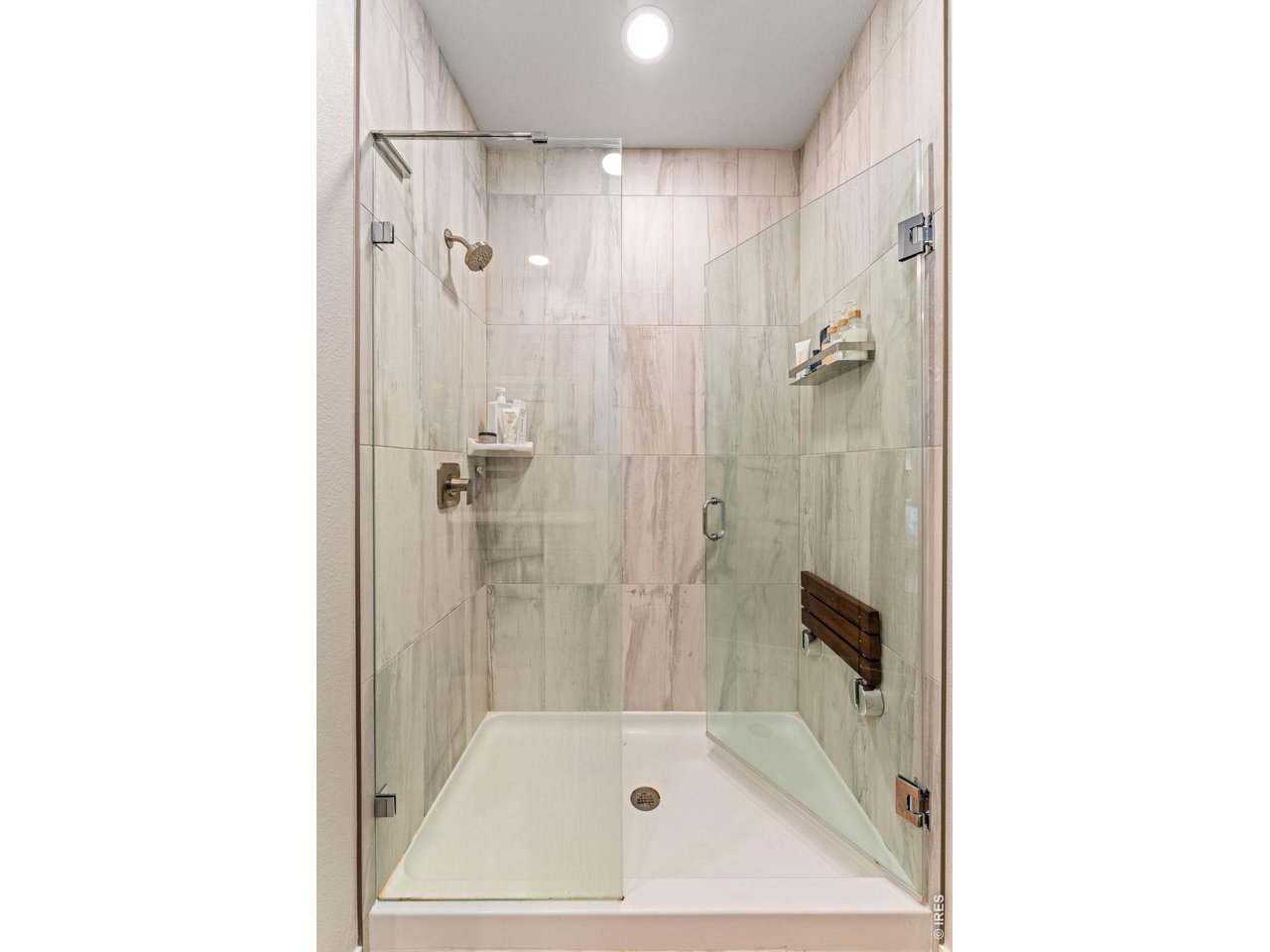 5018 Leopold Loop Timnath, CO 80547 - Photo 29 of 50 a bathroom with a bath tub