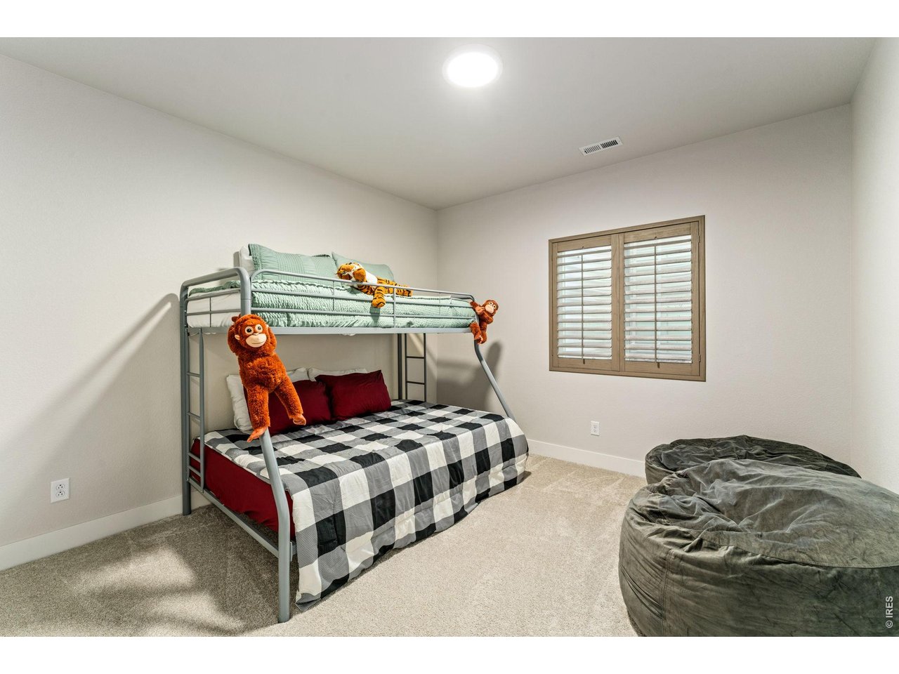5018 Leopold Loop Timnath, CO 80547 - Photo 37 of 50 a bedroom with a bed and a window