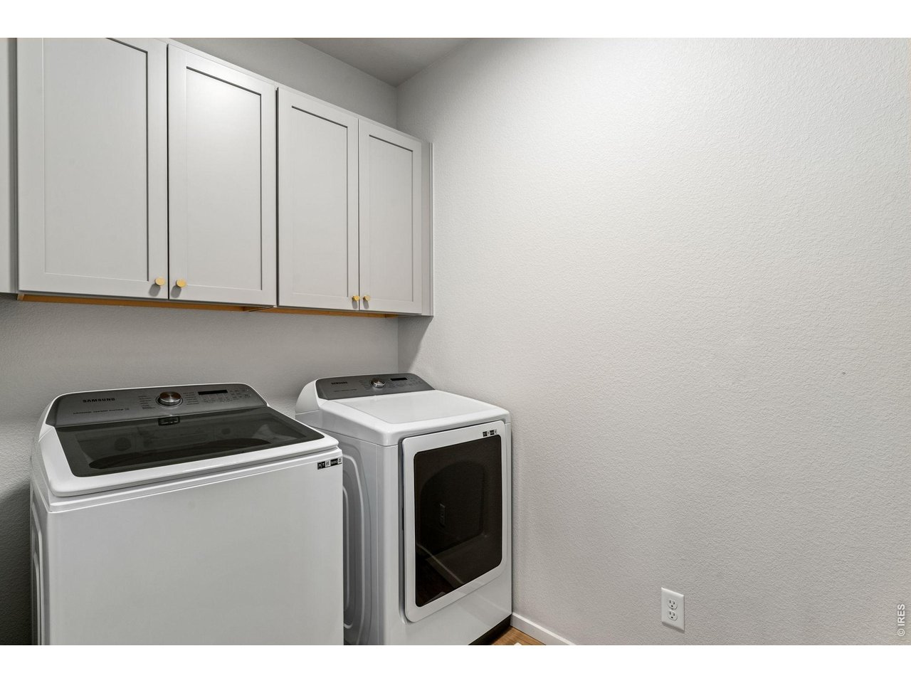 5018 Leopold Loop Timnath, CO 80547 - Photo 40 of 50 a utility room with dryer and washer