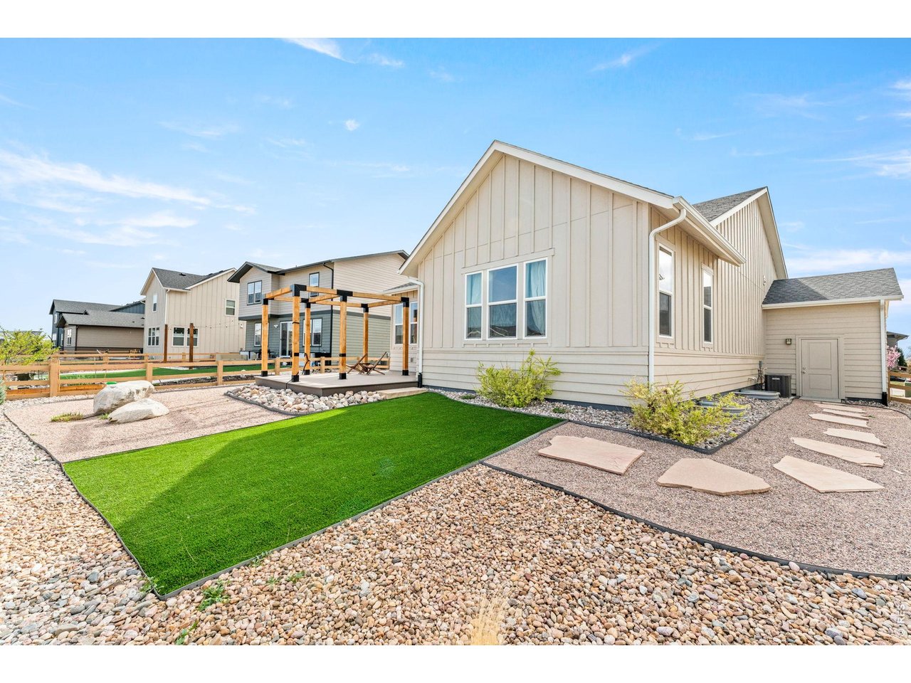 5018 Leopold Loop Timnath, CO 80547 - Photo 44 of 50 a front view of a house with garden