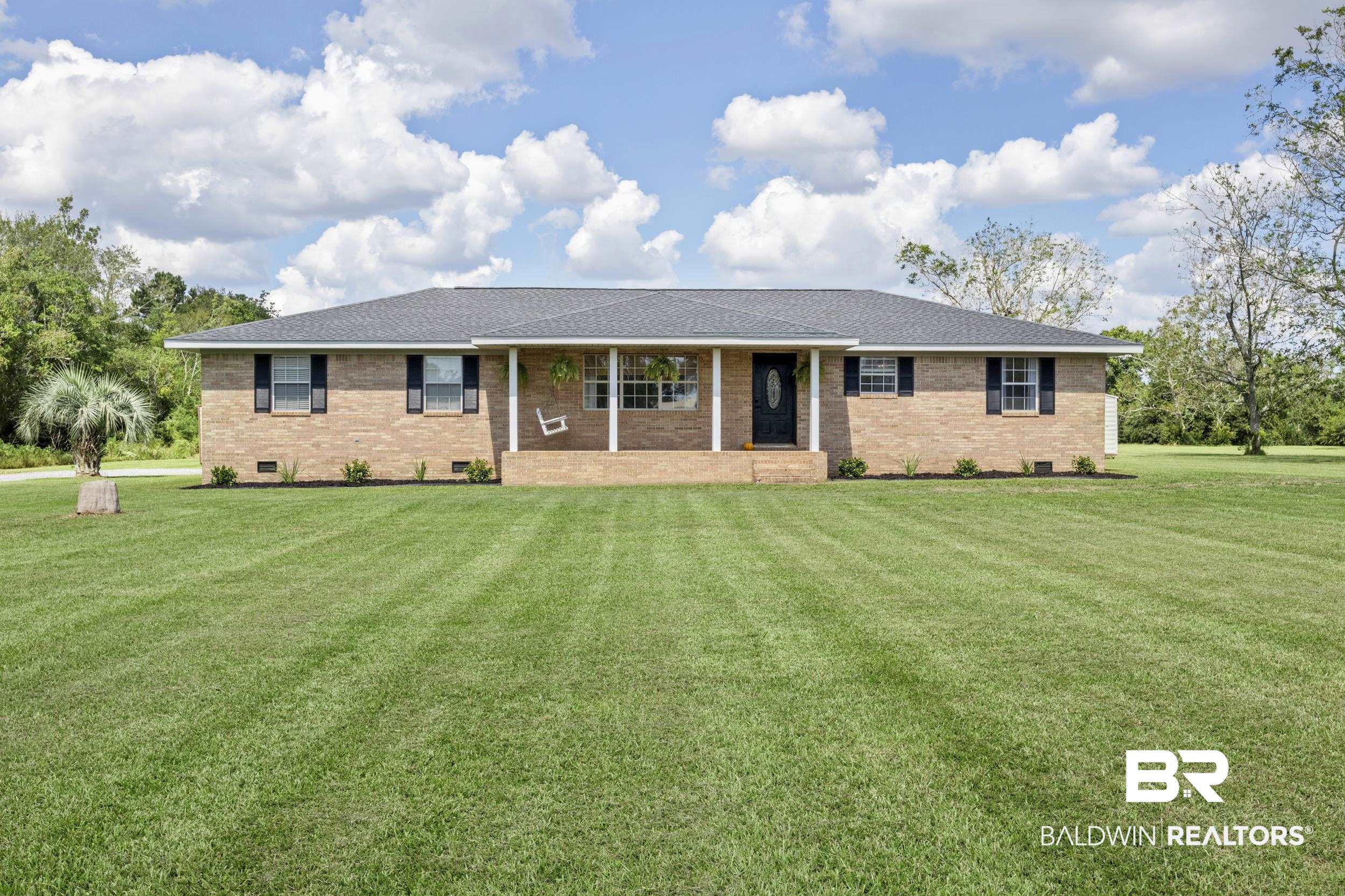 17689 Brewer Road Foley, AL 36535 - Photo 10 of 54 Back of property with a yard