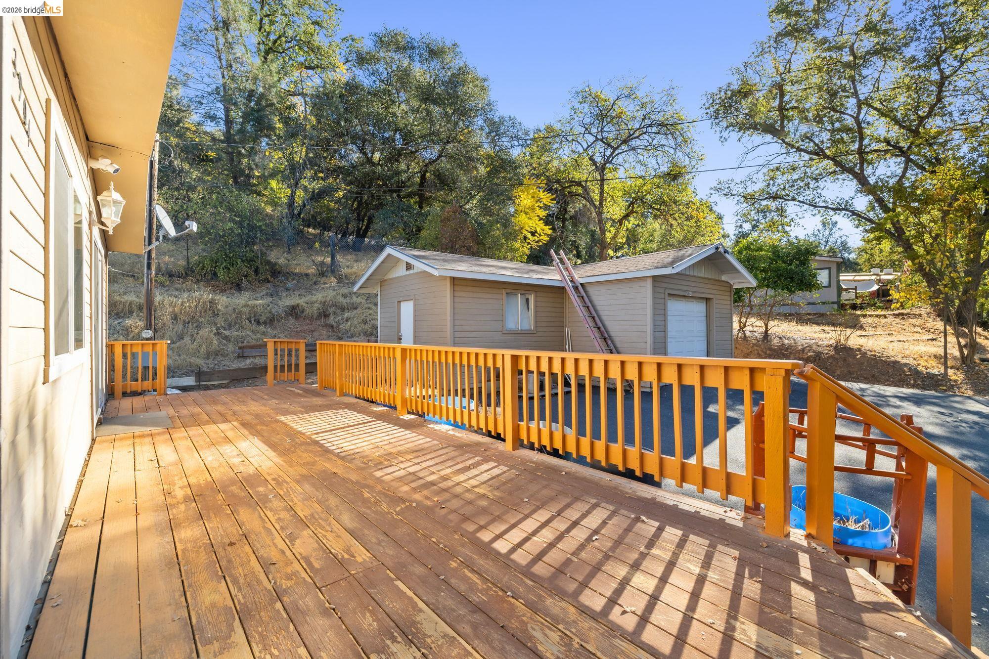 13904 Tuolumne Road Sonora, CA 95370 - Photo 11 of 31 a view of a swimming pool with a patio