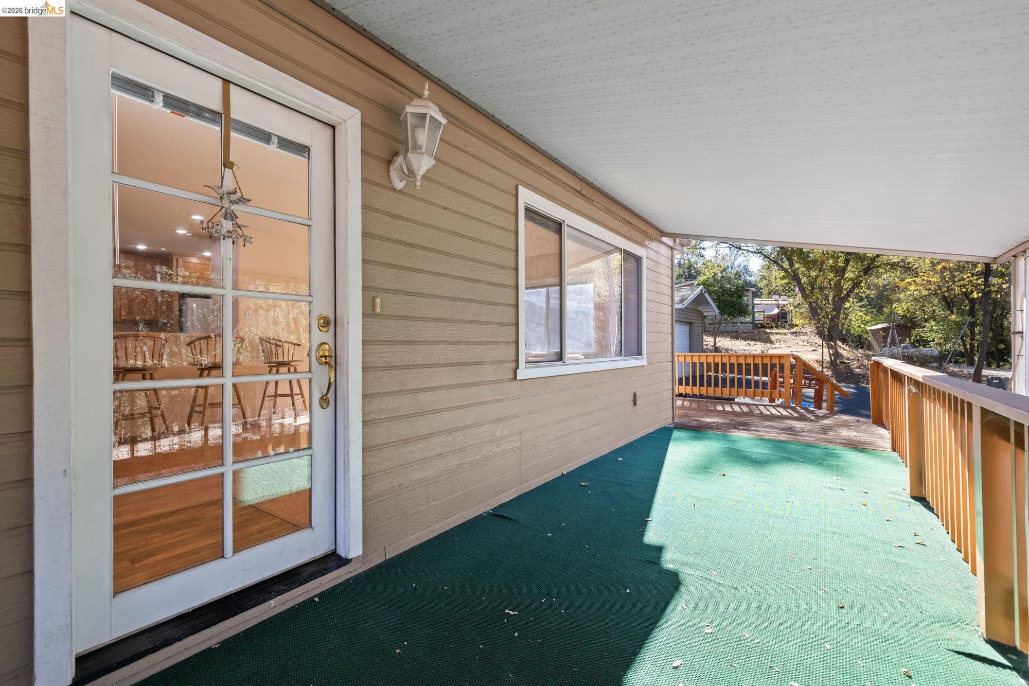 13904 Tuolumne Road Sonora, CA 95370 - Photo 24 of 31 a view of a porch with a backyard