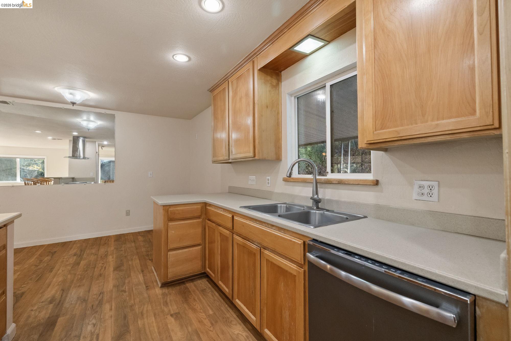 13904 Tuolumne Road Sonora, CA 95370 - Photo 9 of 31 a kitchen that has a sink and a window