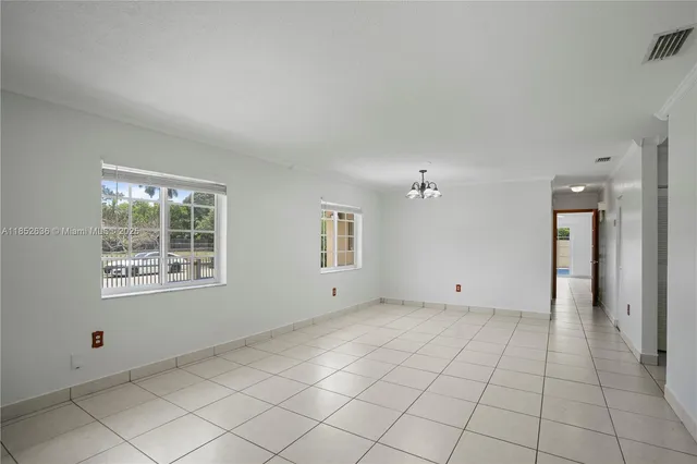 a view of an empty room with window