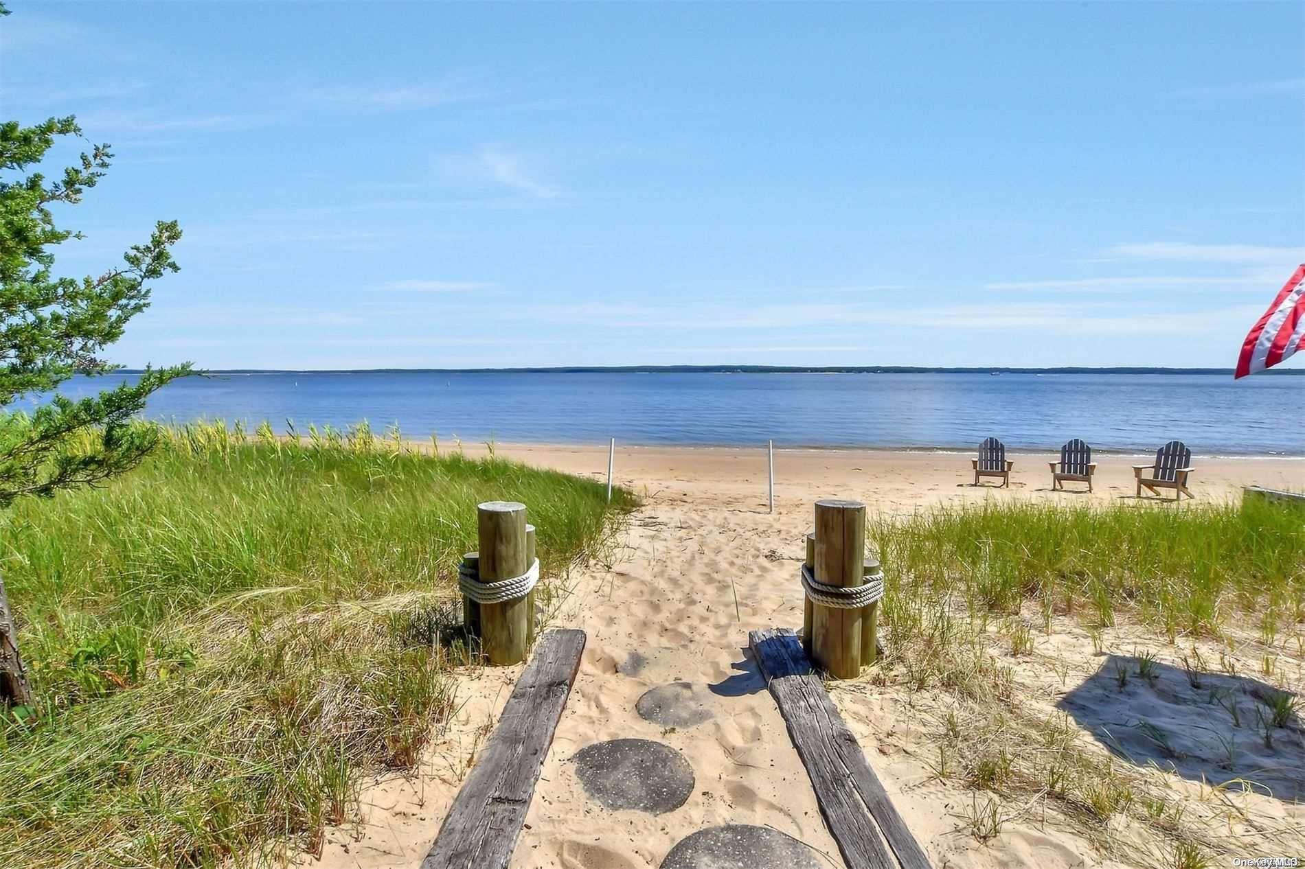 403 Peconic Bay Boulevard Aquebogue, NY 11901 - Photo 1 of 1 a view of a back yard from a balcony