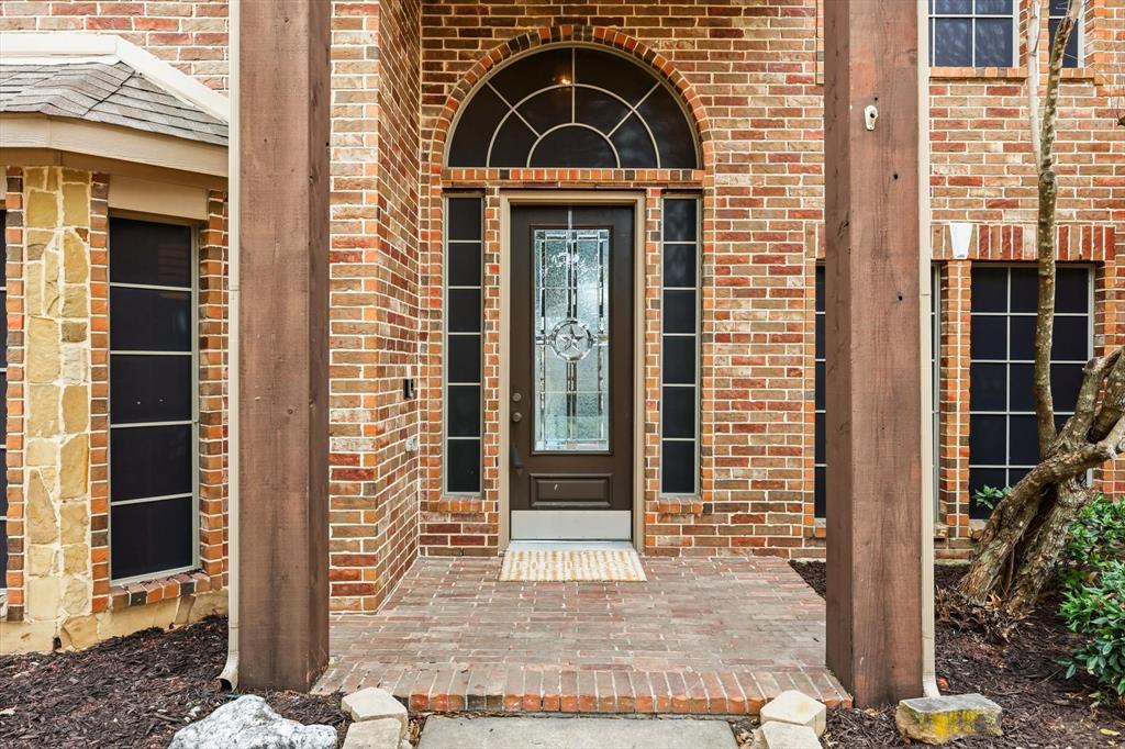 5038 West Fall Drive Midlothian, TX 76065 - Photo 6 of 40 Entrance to property with brick siding and covered porch