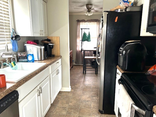 102 Cofer Drive Springfield, TN 37172 - Photo 4 of 18 a kitchen with sink cabinets and window