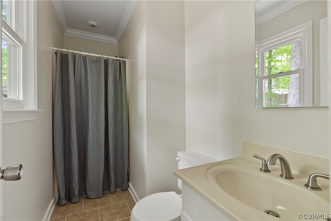 7611 Brightridge Road Chesterfield, VA 23832 - Photo 20 of 38 a bathroom with a sink toilet and shower