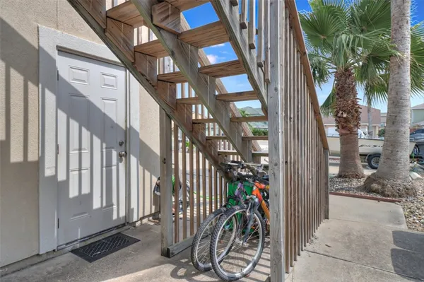 a backyard of a house with palm trees