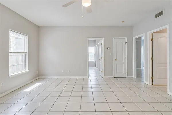 a view of an empty room and window