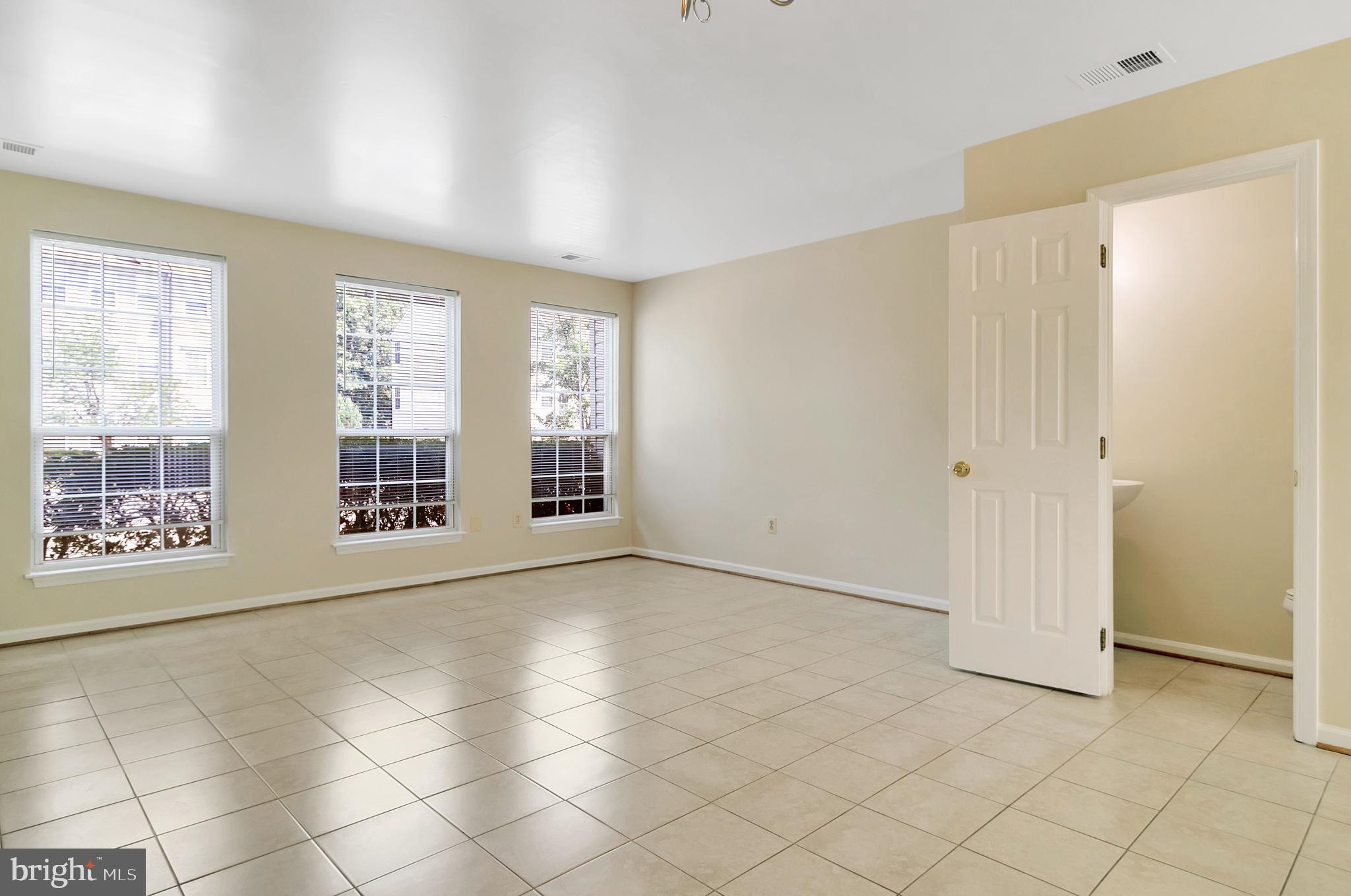 14827 Bolton Road Centreville, VA 20121 - Photo 5 of 32 Living/Dining Room with window view