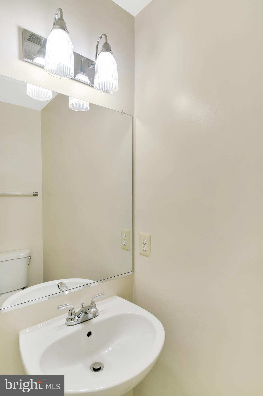 14827 Bolton Road Centreville, VA 20121 - Photo 8 of 32 Half bath with pedestal vanity sink