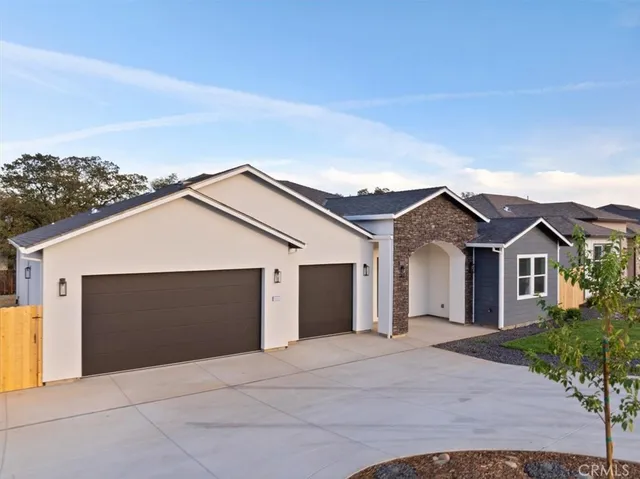 front view of a house with a garage