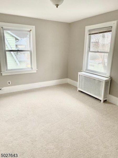 927 South Park Terrace, Unit 2 Union, NJ 07083 - Photo 5 of 12 an empty room with a window