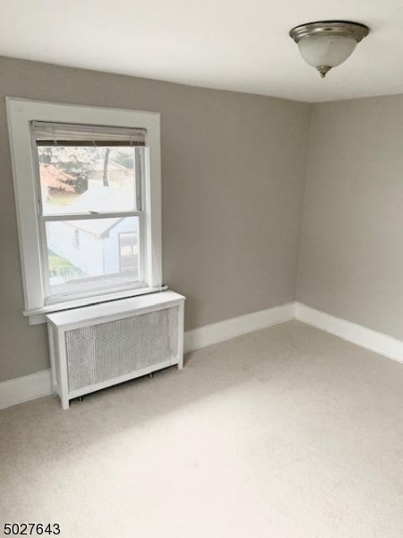 927 South Park Terrace, Unit 2 Union, NJ 07083 - Photo 6 of 12 an empty room with a window
