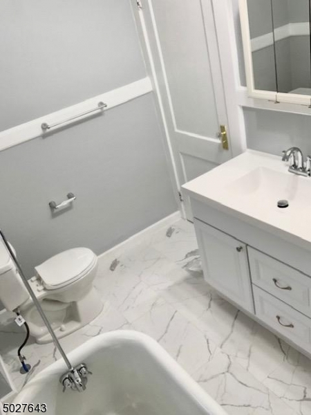 927 South Park Terrace, Unit 2 Union, NJ 07083 - Photo 9 of 12 a bathroom with a sink and toilet