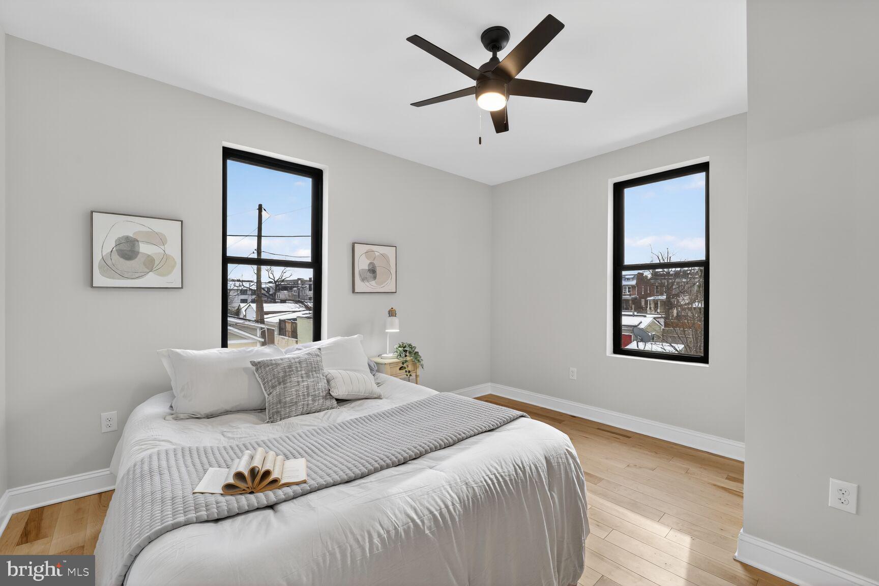 4017 14th Street Northwest Washington, DC 20011 - Photo 12 of 25 a bedroom with a large bed and a window