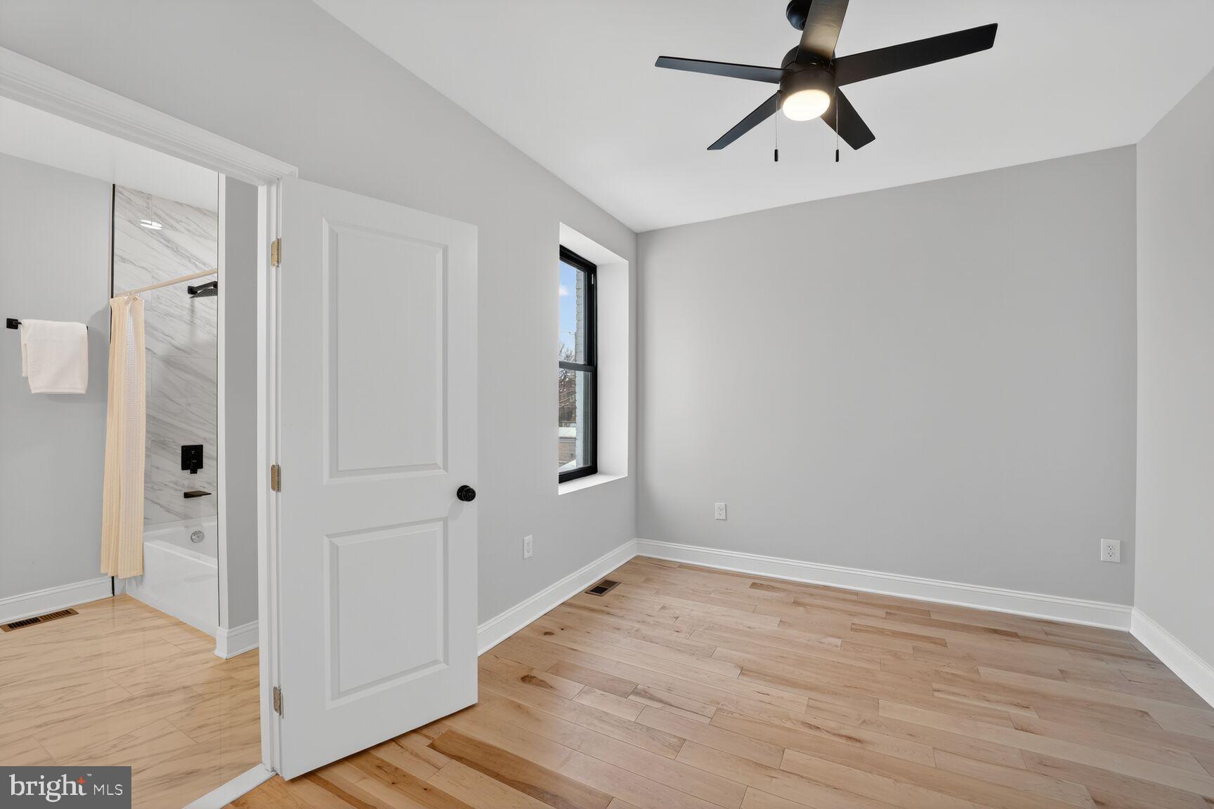 4017 14th Street Northwest Washington, DC 20011 - Photo 15 of 25 wooden floor in an empty room