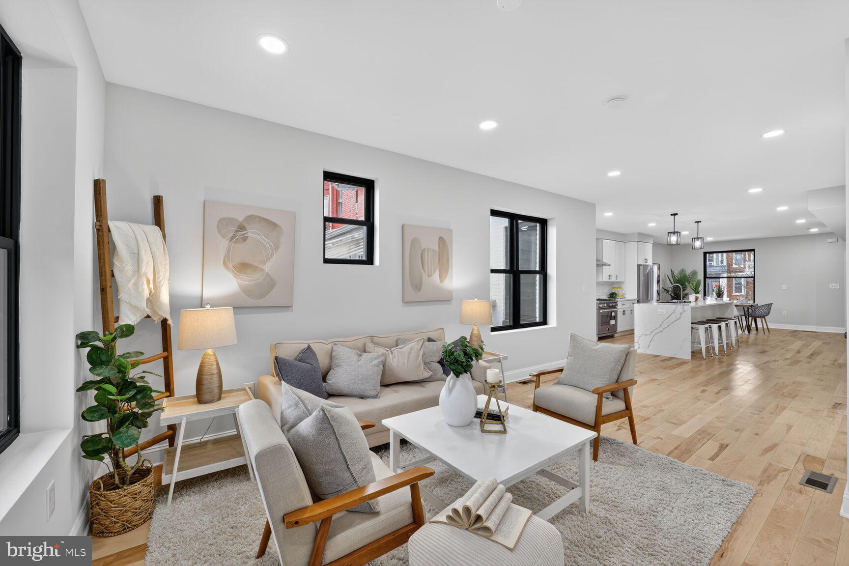 4017 14th Street Northwest Washington, DC 20011 - Photo 7 of 25 a living room with furniture and a flat screen tv