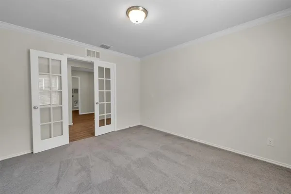 an empty room with windows