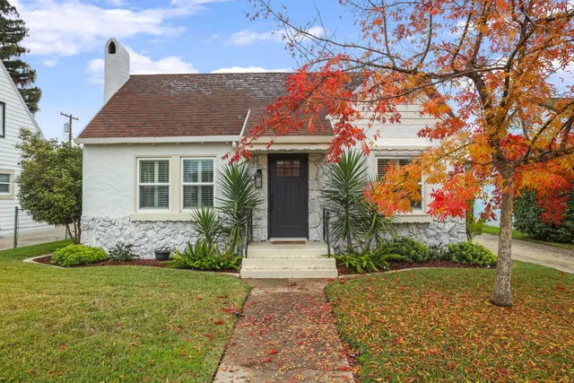 front view of a house with a yard