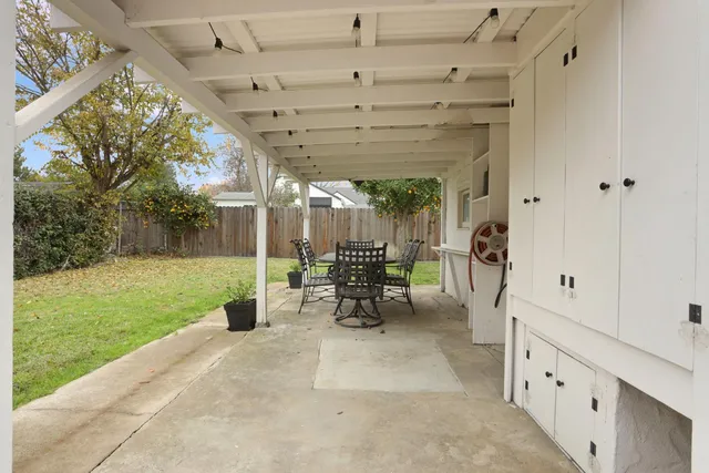 a view of swimming pool with a patio
