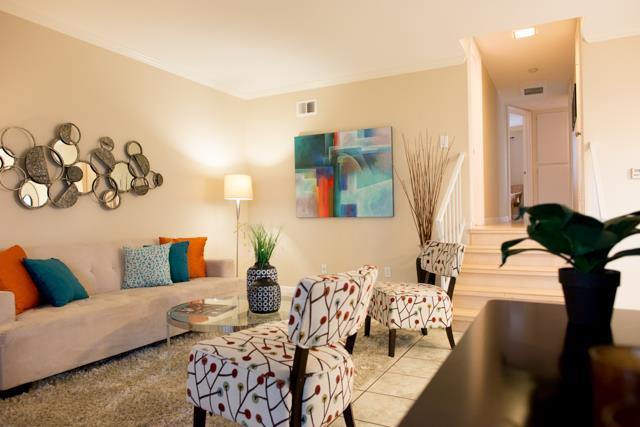 417 Kenbrook Circle San Jose, CA 95111 - Photo 5 of 22 a living room with furniture and a large mirror