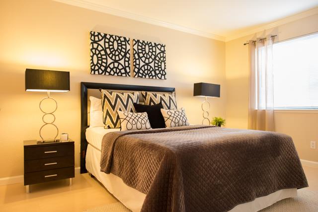 417 Kenbrook Circle San Jose, CA 95111 - Photo 7 of 22 a bedroom with a bed and a flat screen tv