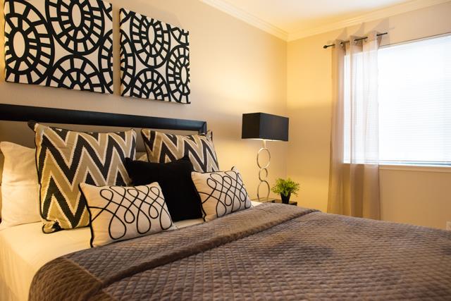 417 Kenbrook Circle San Jose, CA 95111 - Photo 8 of 22 a bedroom with a bed and wooden floor