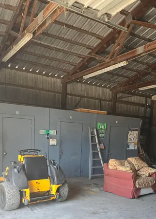 a view of a building with car parked