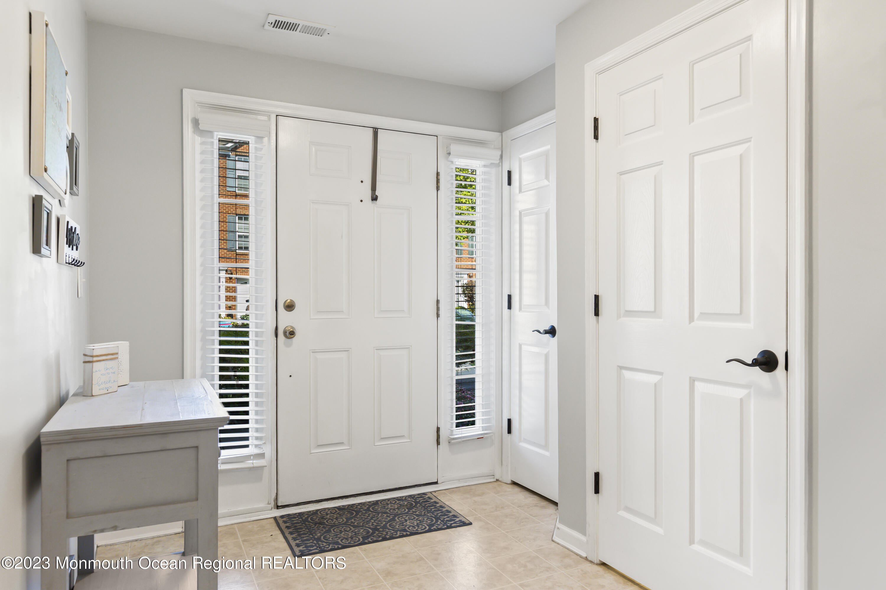 59 Saxton Road Farmingdale, NJ 07727 - Photo 3 of 30 a view of a bathroom with wooden floor