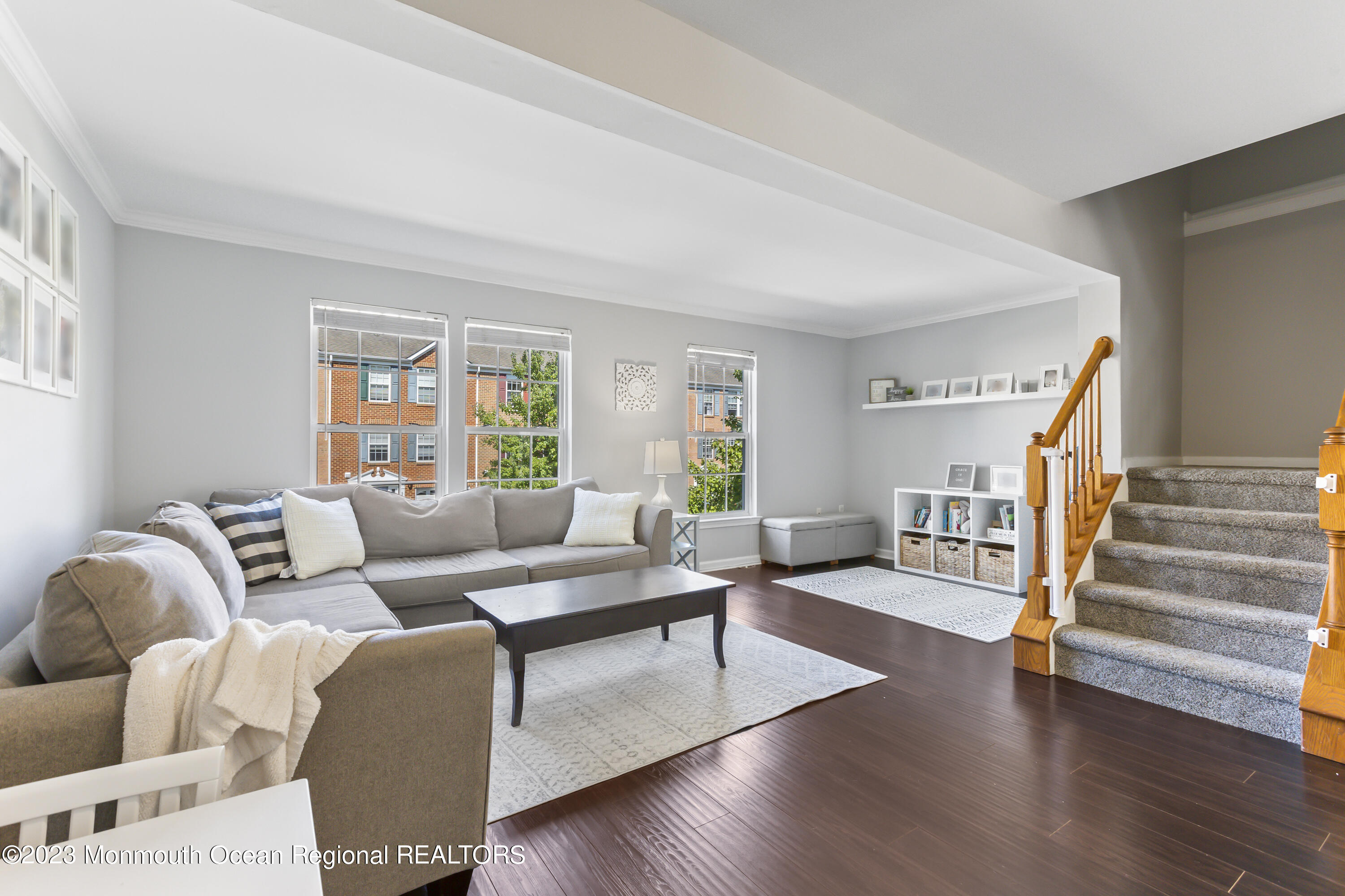 59 Saxton Road Farmingdale, NJ 07727 - Photo 9 of 30 a living room with furniture and a wooden floor