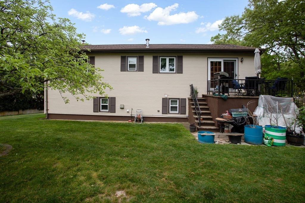 166 Stonehaven Road Fall River, MA 02723 - Photo 31 of 33 a view of a house with backyard and a tree