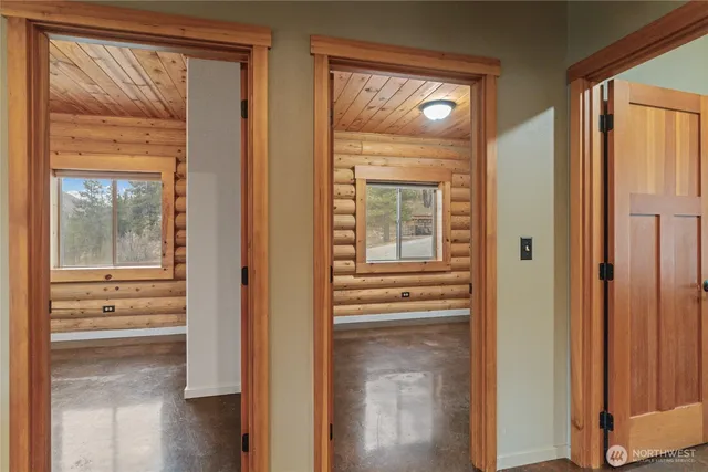 a view of entryway with wooden floor