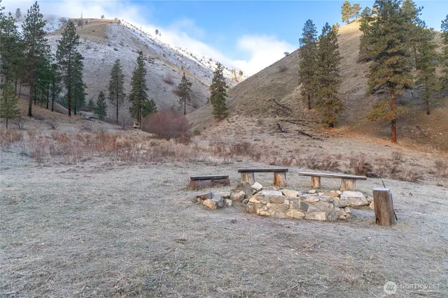 a kitchen with stainless steel appliances kitchen island sink refrigerator and stove