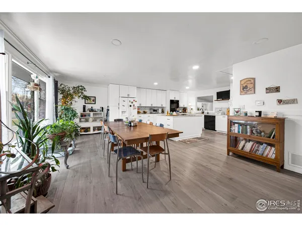 a outdoor space with furniture and wooden floor