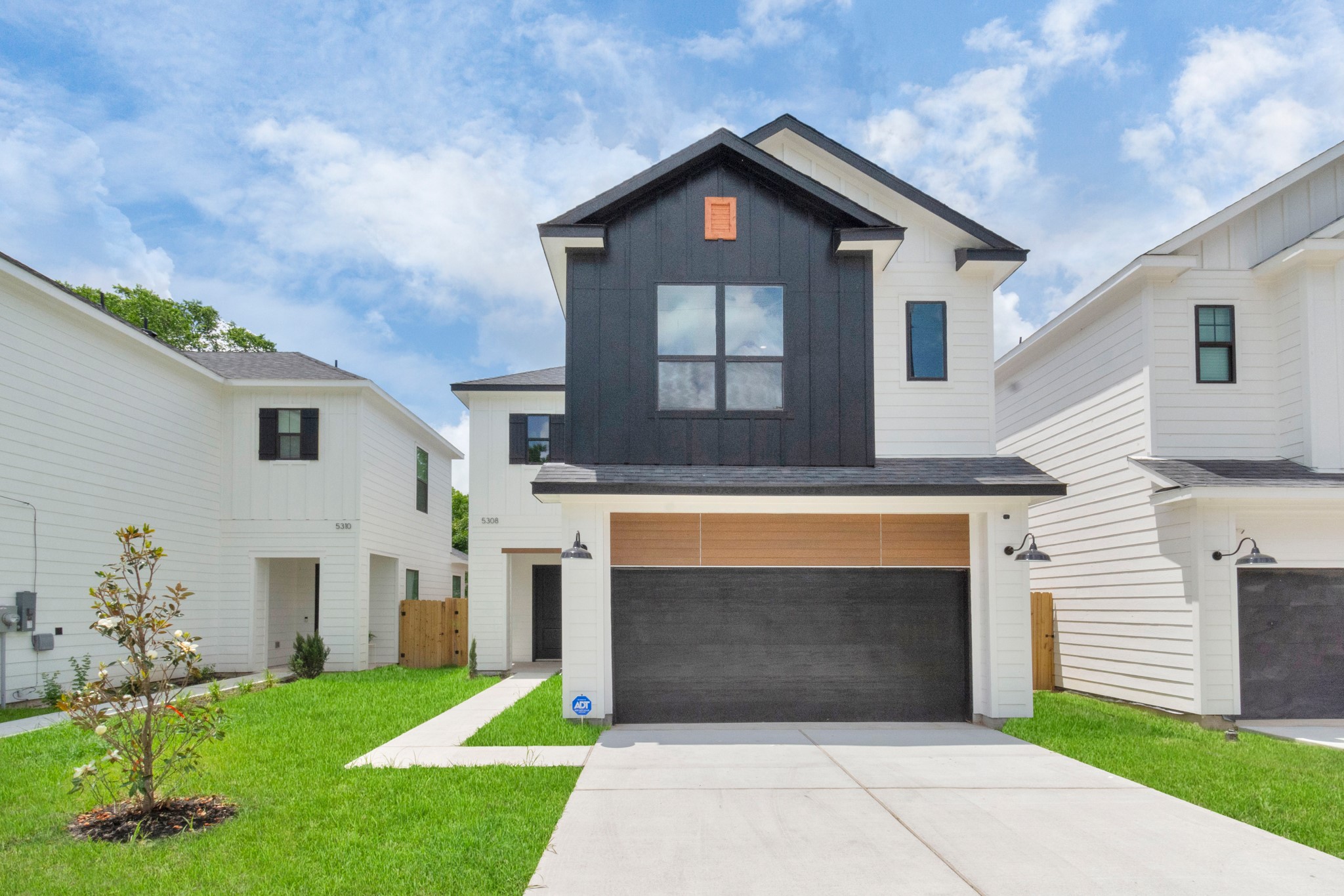 5308 Denmark Street Houston, TX 77028 - Photo 1 of 36 a front view of a house with a yard