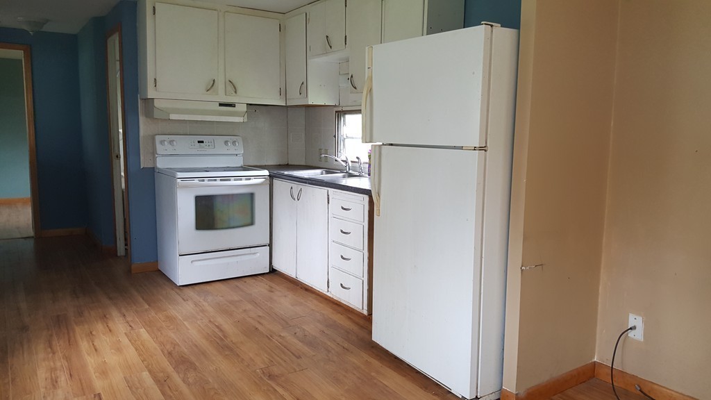 78 Better Way Springfield, MA 01119 - Photo 5 of 10 a kitchen with stainless steel appliances a refrigerator and a stove