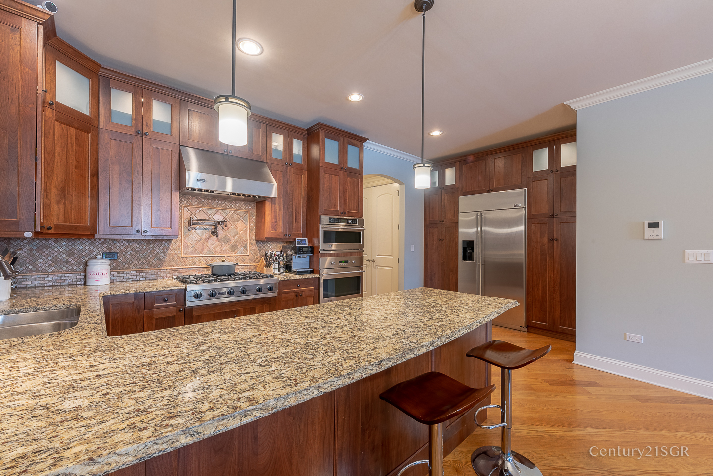 106 South Sangamon Street, Unit 2S Chicago, IL 60607 - Photo 13 of 29 a kitchen with stainless steel appliances granite countertop a sink refrigerator and cabinets