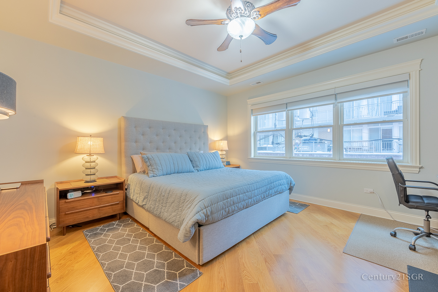 106 South Sangamon Street, Unit 2S Chicago, IL 60607 - Photo 16 of 29 a bedroom with a bed and window