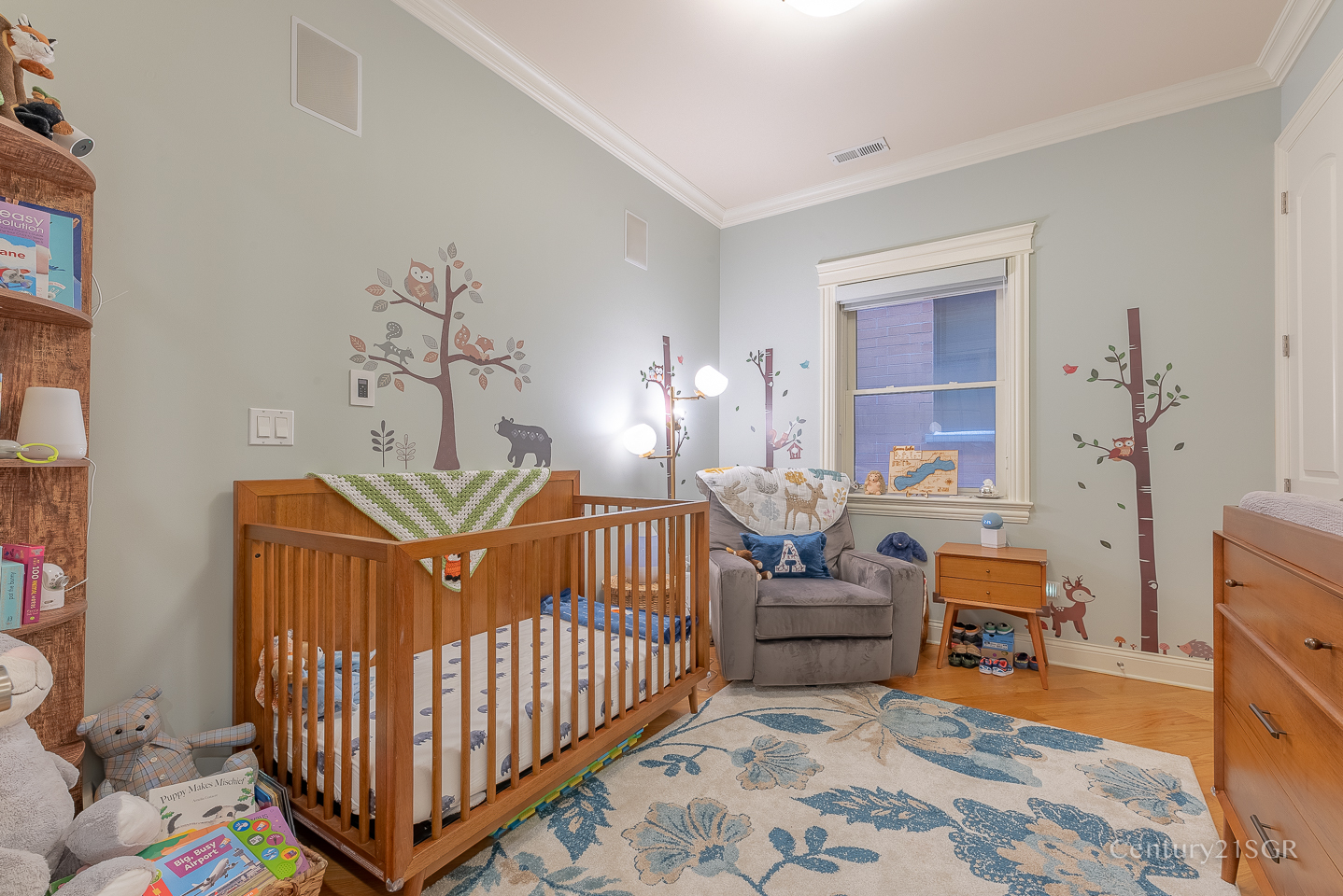 106 South Sangamon Street, Unit 2S Chicago, IL 60607 - Photo 23 of 29 a bedroom with furniture and a baby crib